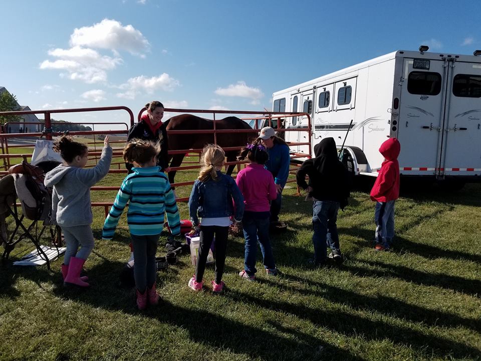 Zielanis Elementary School students by horse